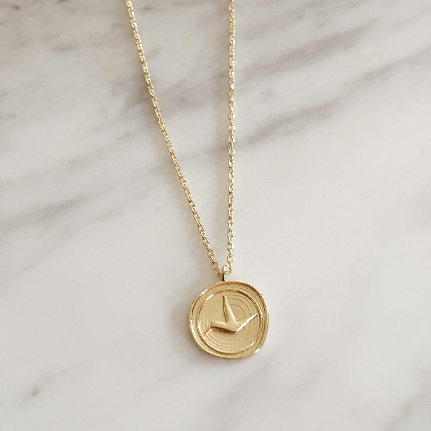 golden flight bird necklace