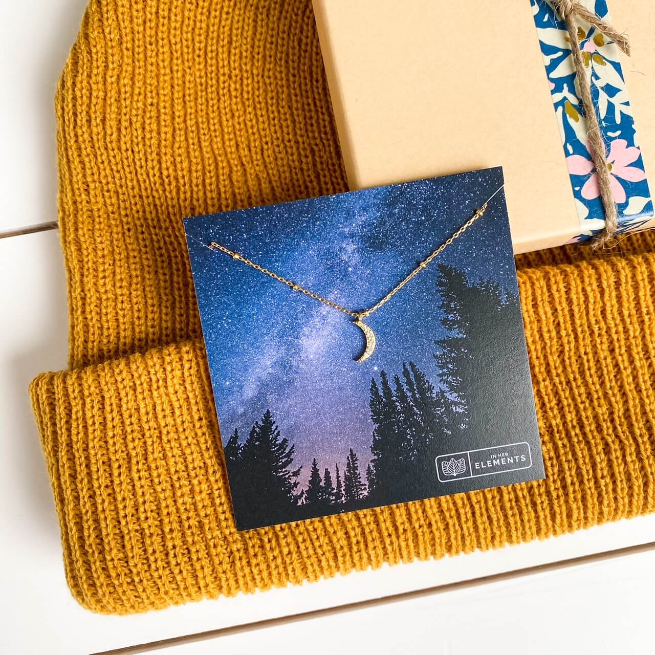 meadow gold beanie and mini moon necklace